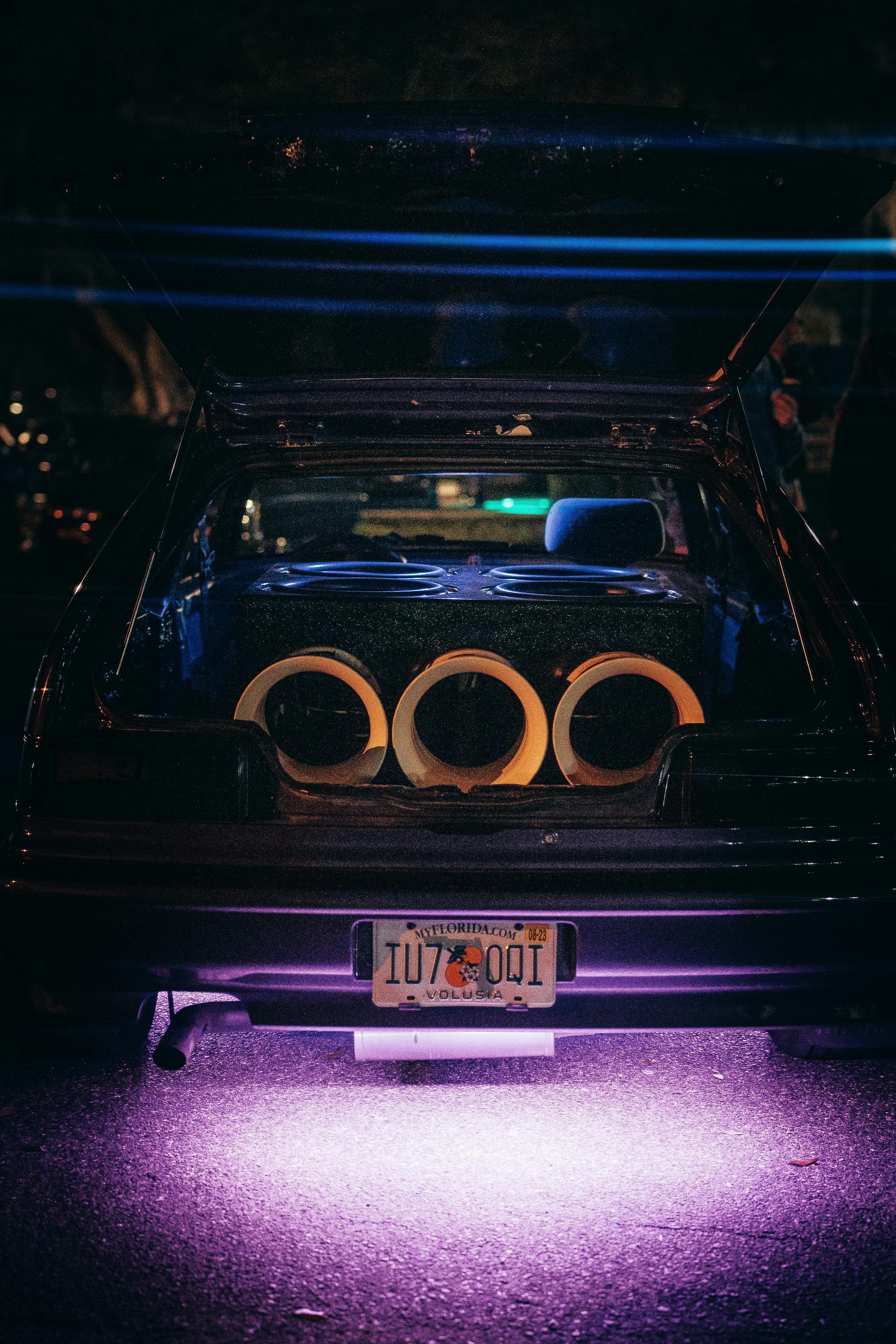 Large Speakers in the Car Trunk and an LED Light under the Car