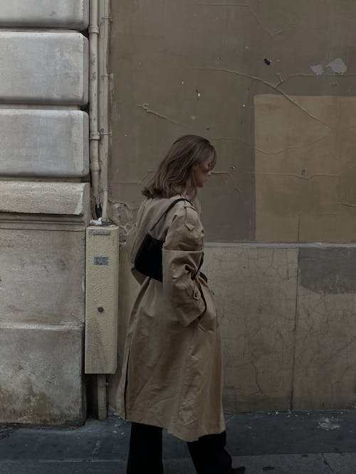 Brunette Woman in Coat on Sidewalk