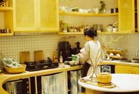 Cook preparing food in a warm kitchen — photo by Nam Quan Nguyen on Pexels