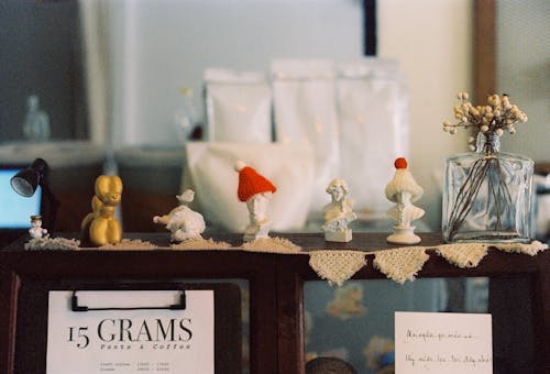 Figurines on a Restaurant Counter 