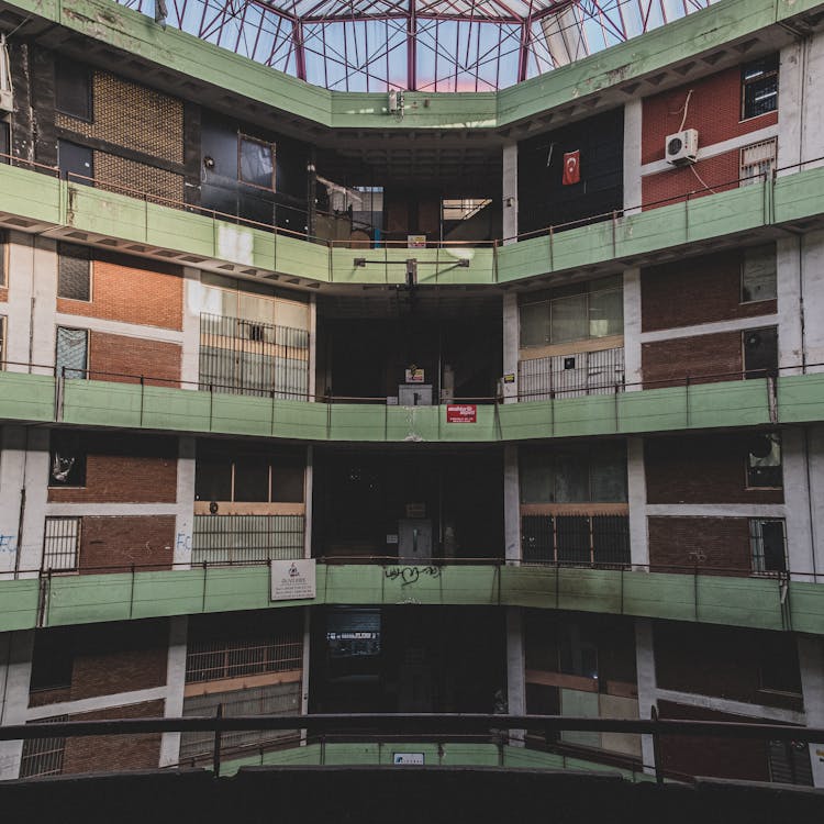 Building Walls Under Glass Ceiling