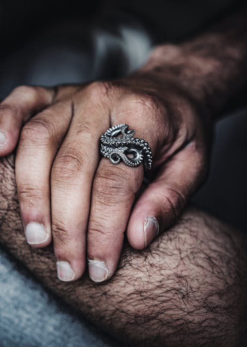 Close-up of Man Wearing a Octopus Tentacle Ring