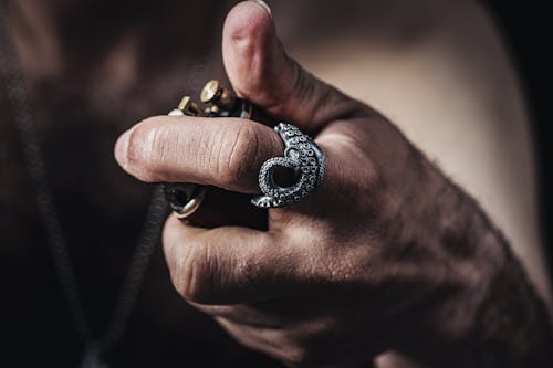 Man Wearing Silver Octopus Ring 