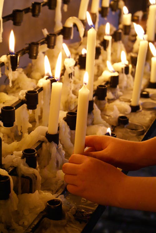 Rows of Burning Candles