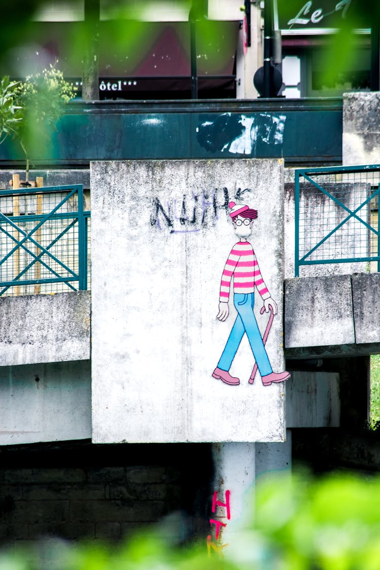 Drawing Of Walking Man On Bridge Wall