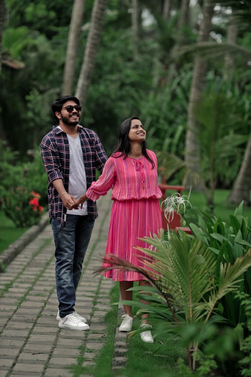 Smiling Couple among Trees