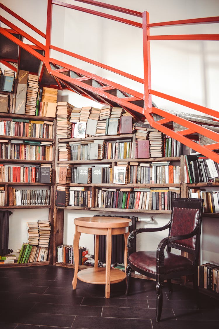 Book Lots On Wooden Shelf