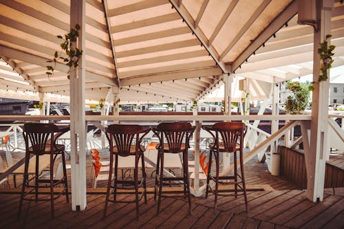 Free Brown Wooden Bar Stools Stock Photo