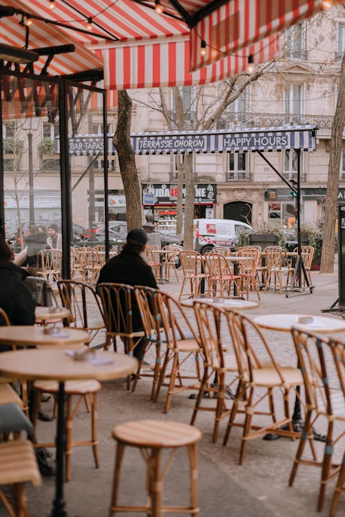 A woman sitting at a table in a cafe