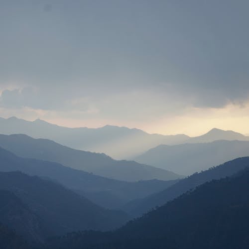 丘陵, 垂直拍摄, 多雲的 的 免费素材图片