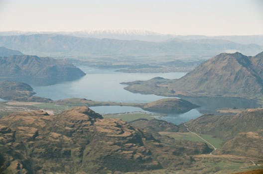 Stunning aerial photograph of Lake Wanaka surrounded by New Zealand's majestic mountains and valleys.