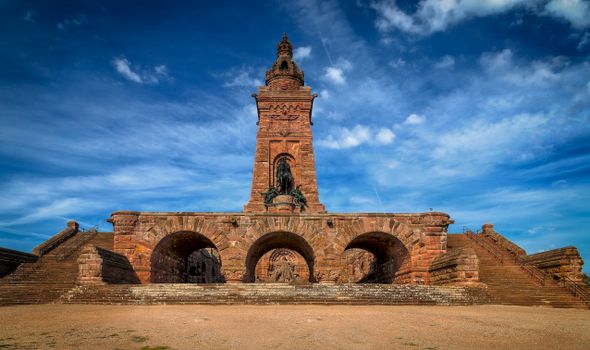 Stunning view of the Kyffhäuser Monument in Germany against a vivid blue sky., free online jigsaw puzzle on JigsawPuzzlesFreeOnline.org
