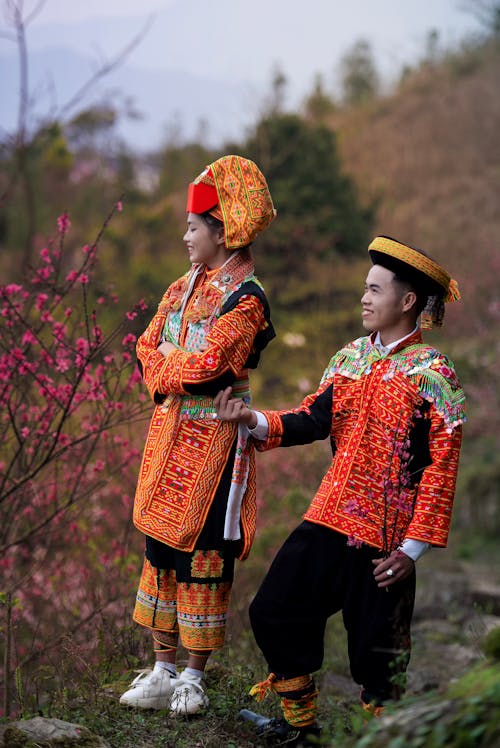 Man and Woman Wearing Traditional Colorful Clothing 