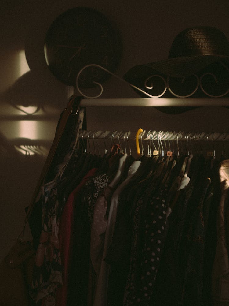 Clothes On A Clothing Rack In A Closet 