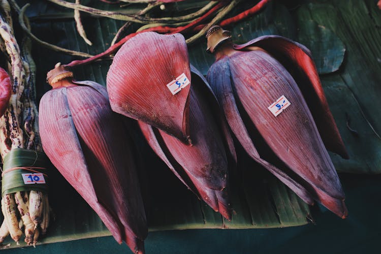 Banana Flowers On A Market Stall 