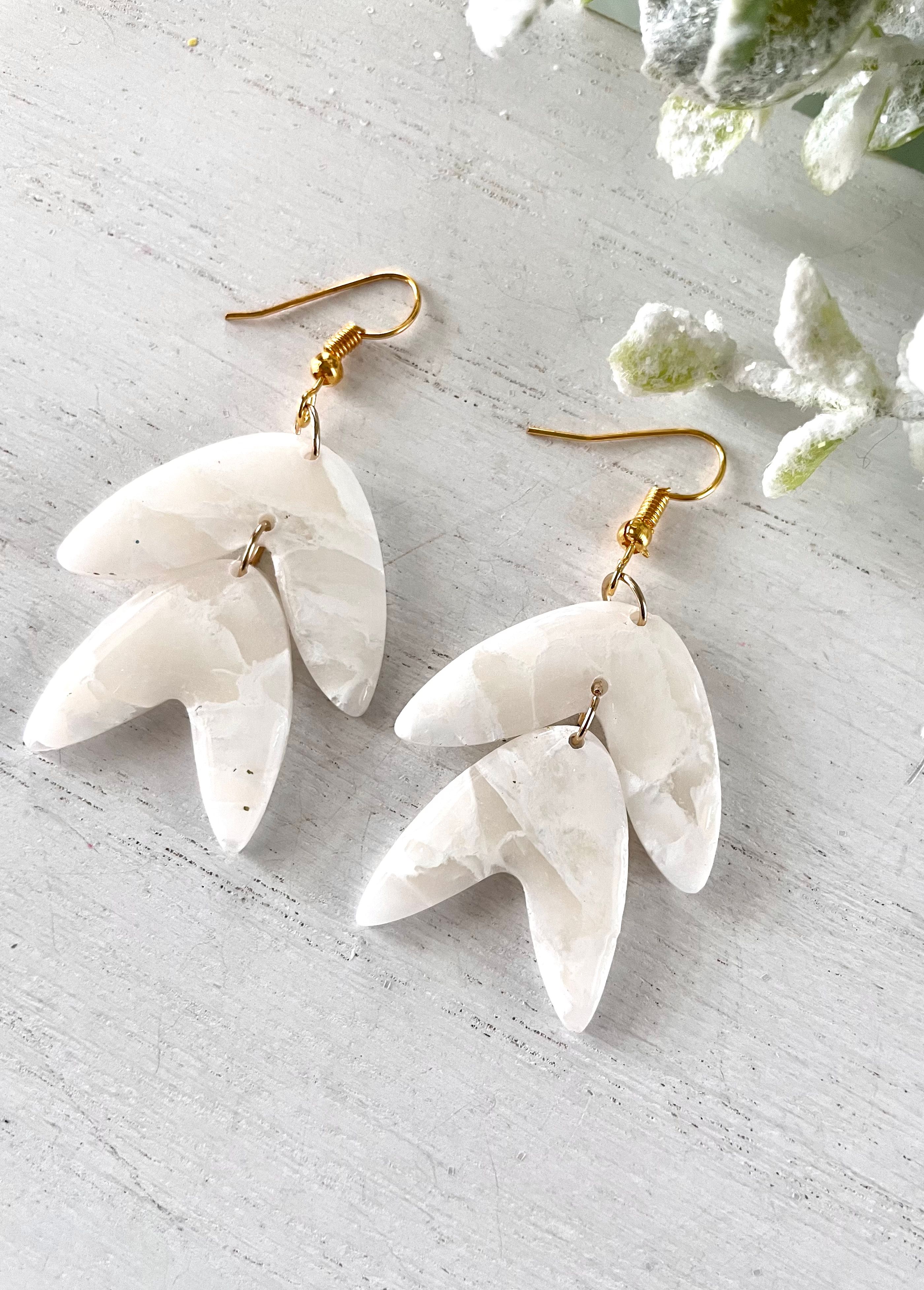 Marbled stone drop earrings with brass hooks — photo by Mercedes Alvarado on Pexels