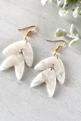 Marbled stone drop earrings with brass hooks — photo by Mercedes Alvarado on Pexels