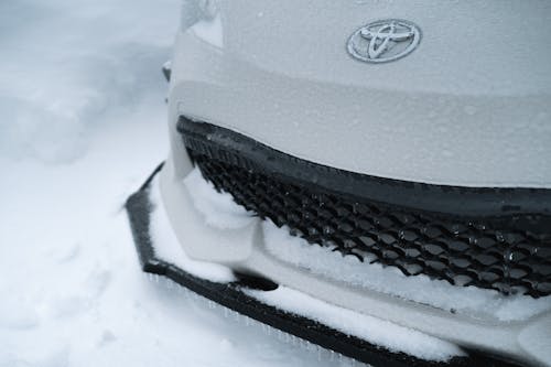 Snow on White Toyota
