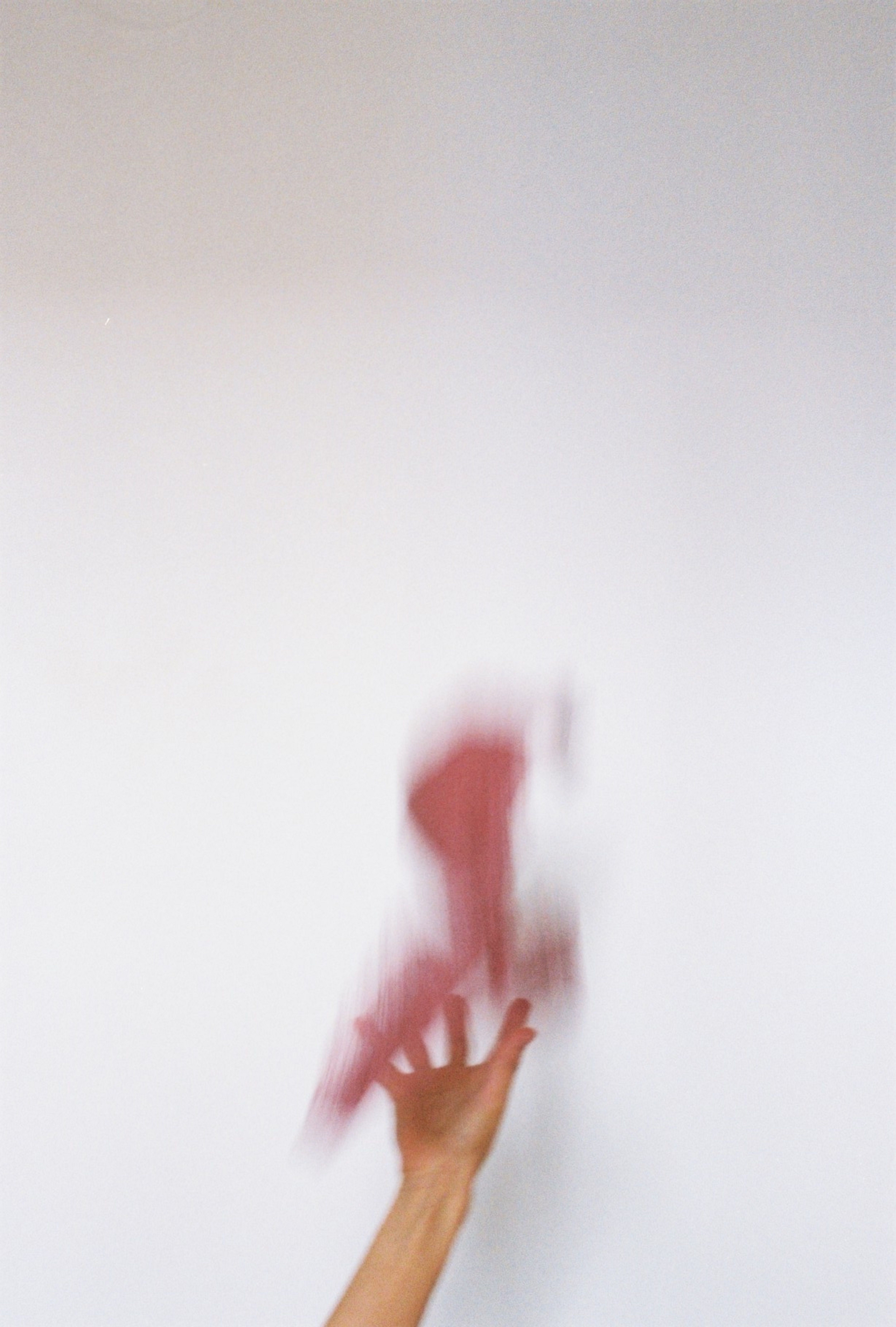 Hand Throwing Something · Free Stock Photo