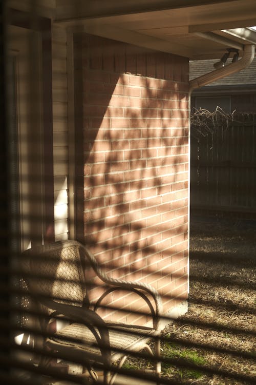 Free Chair in front of House Stock Photo