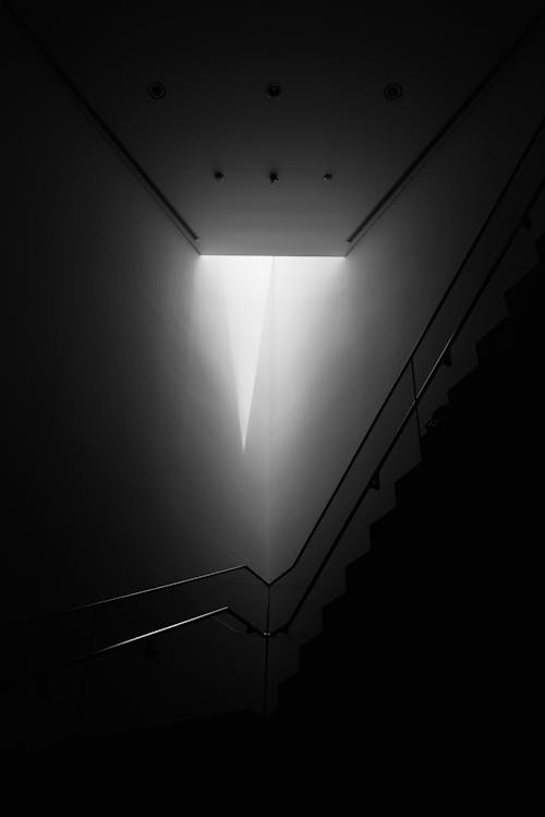 Black and White Picture of a Dark Corner in a Modern Building 