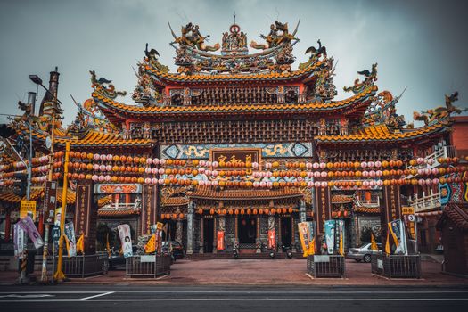 Beautiful Taiwanese temple adorned with colorful lanterns and intricate designs.