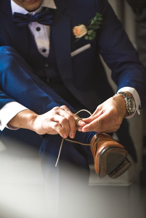 Free Person Tying Shoelaces Stock Photo