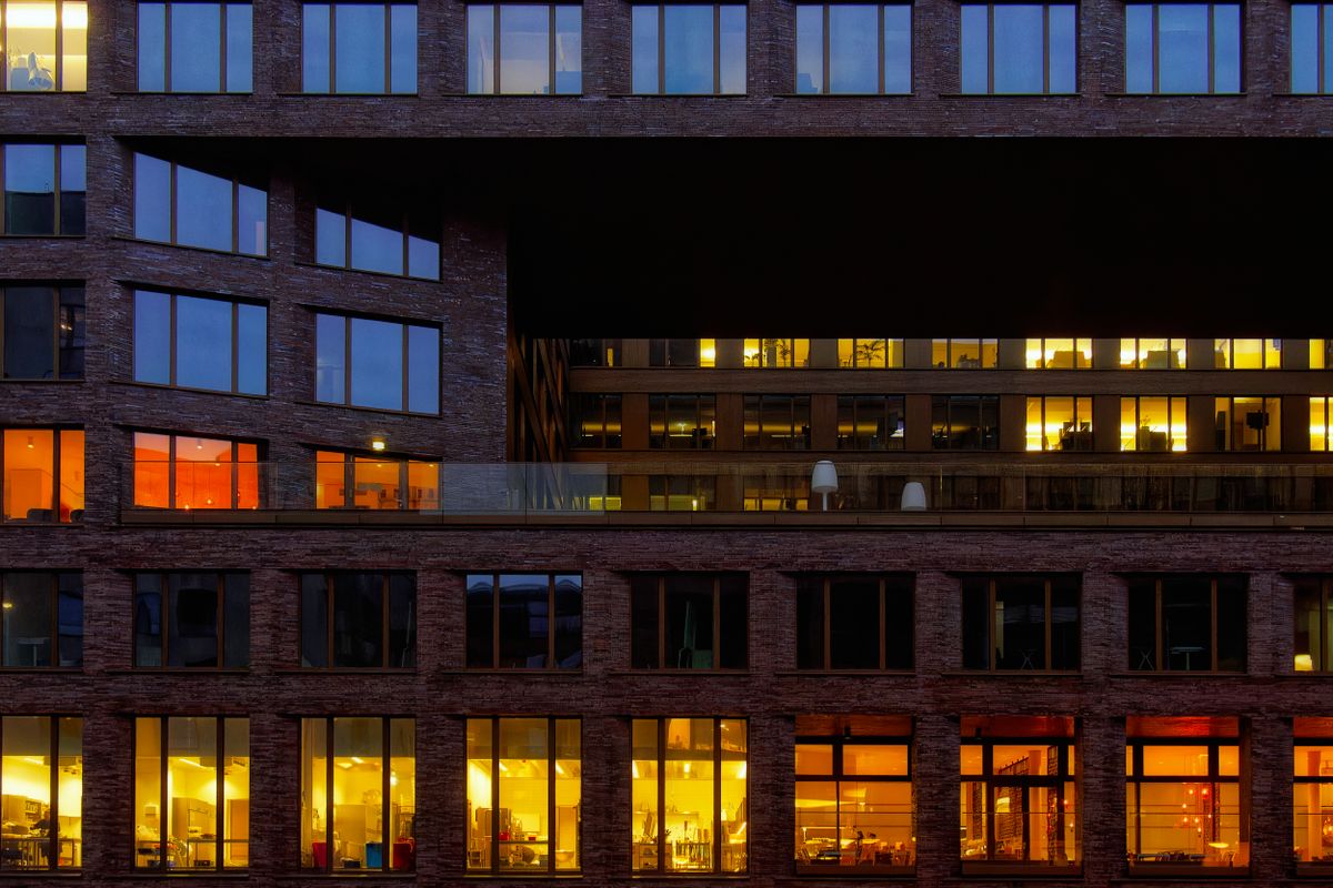 Illuminated office building exterior at night