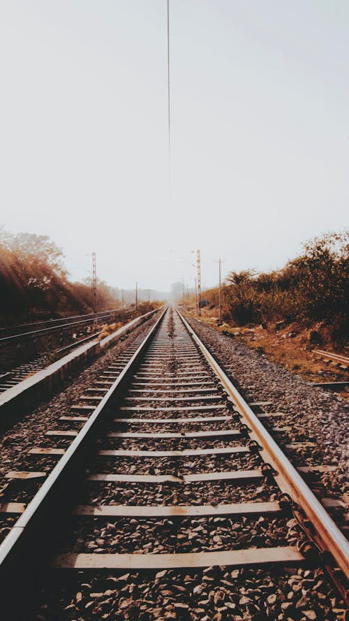 Безкоштовне стокове фото на тему «вертикальні постріл, залізниця, залізнична колія»