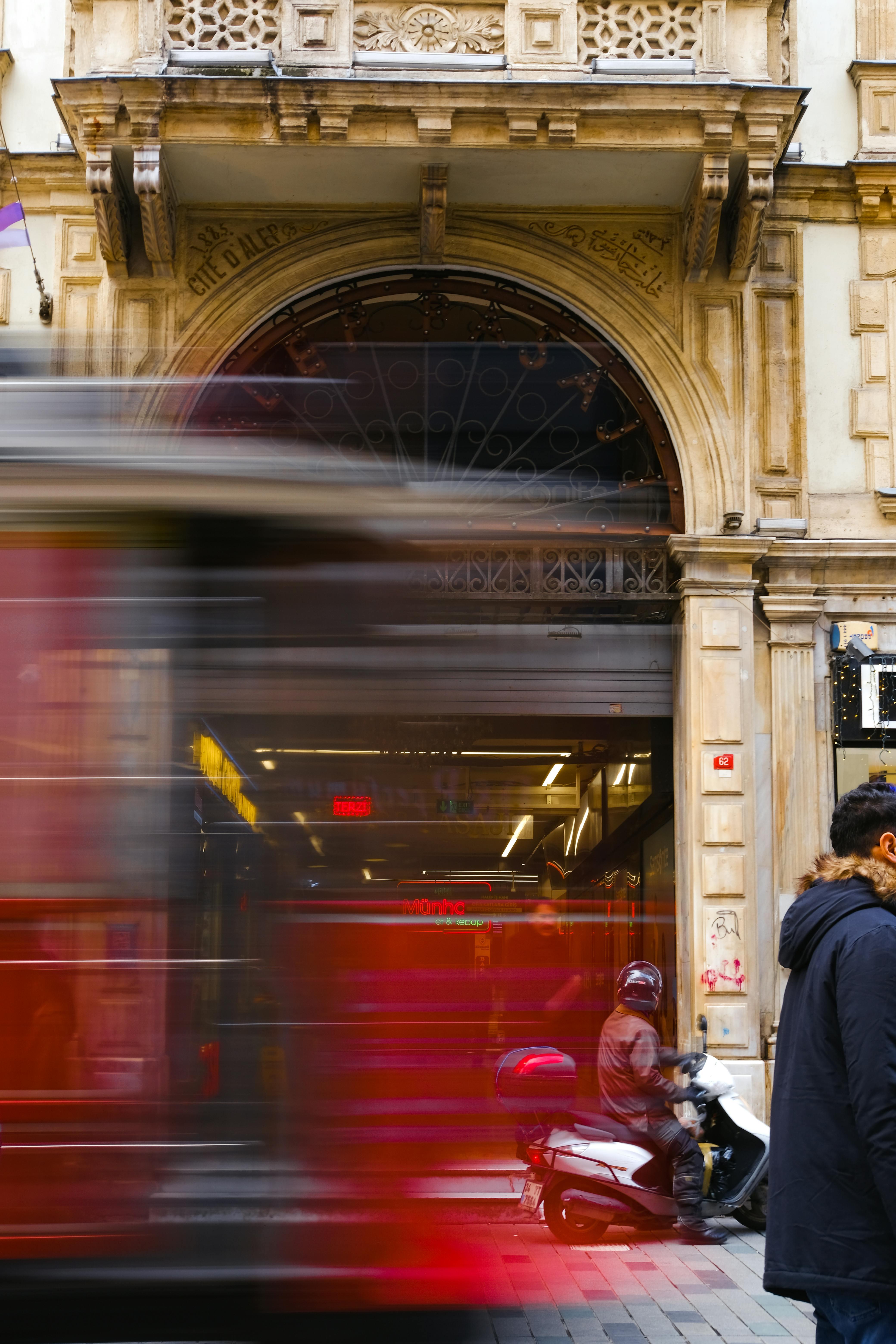 blurred motion photo of a bus in a city