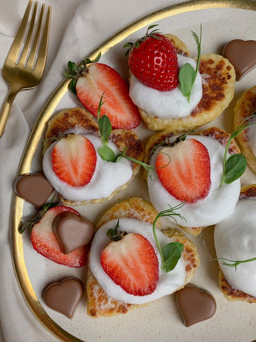 Free Heart Pancakes with Cream and Strawberries Stock Photo