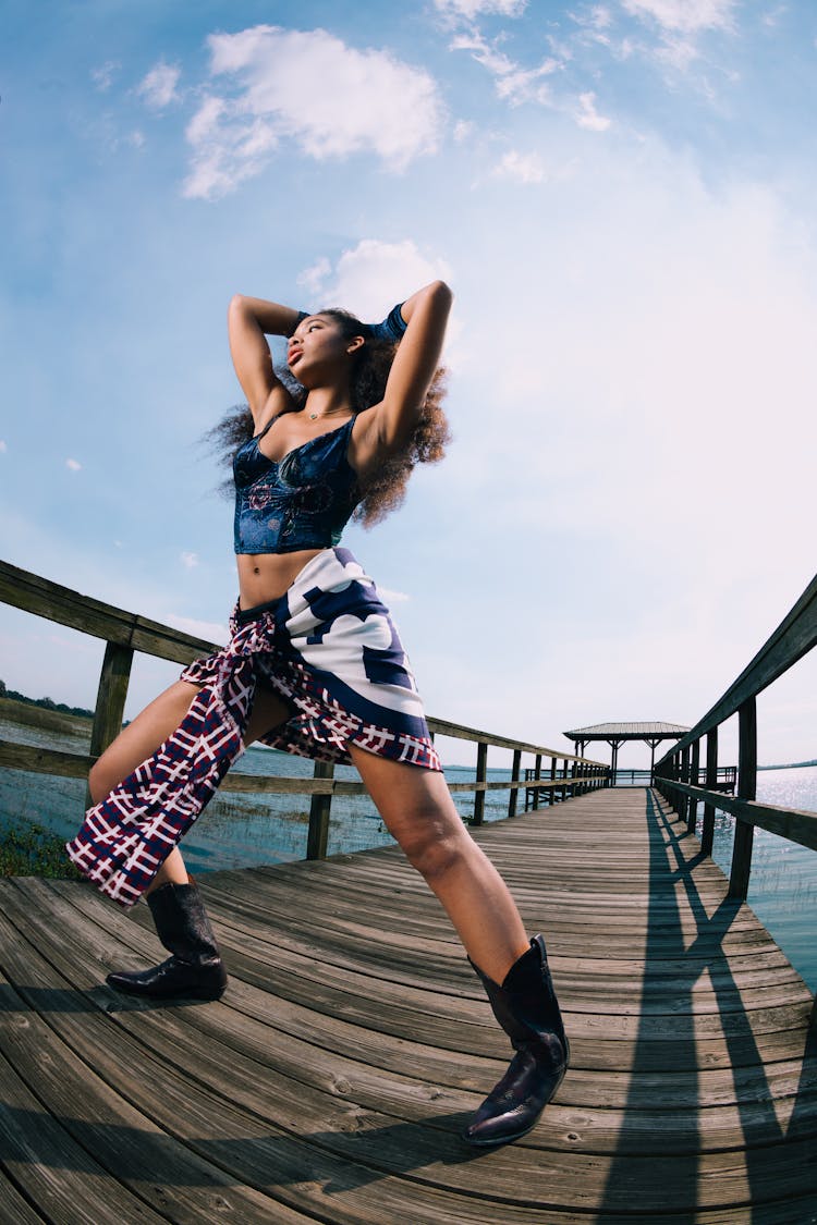 Woman Wearing Shorts On Pier