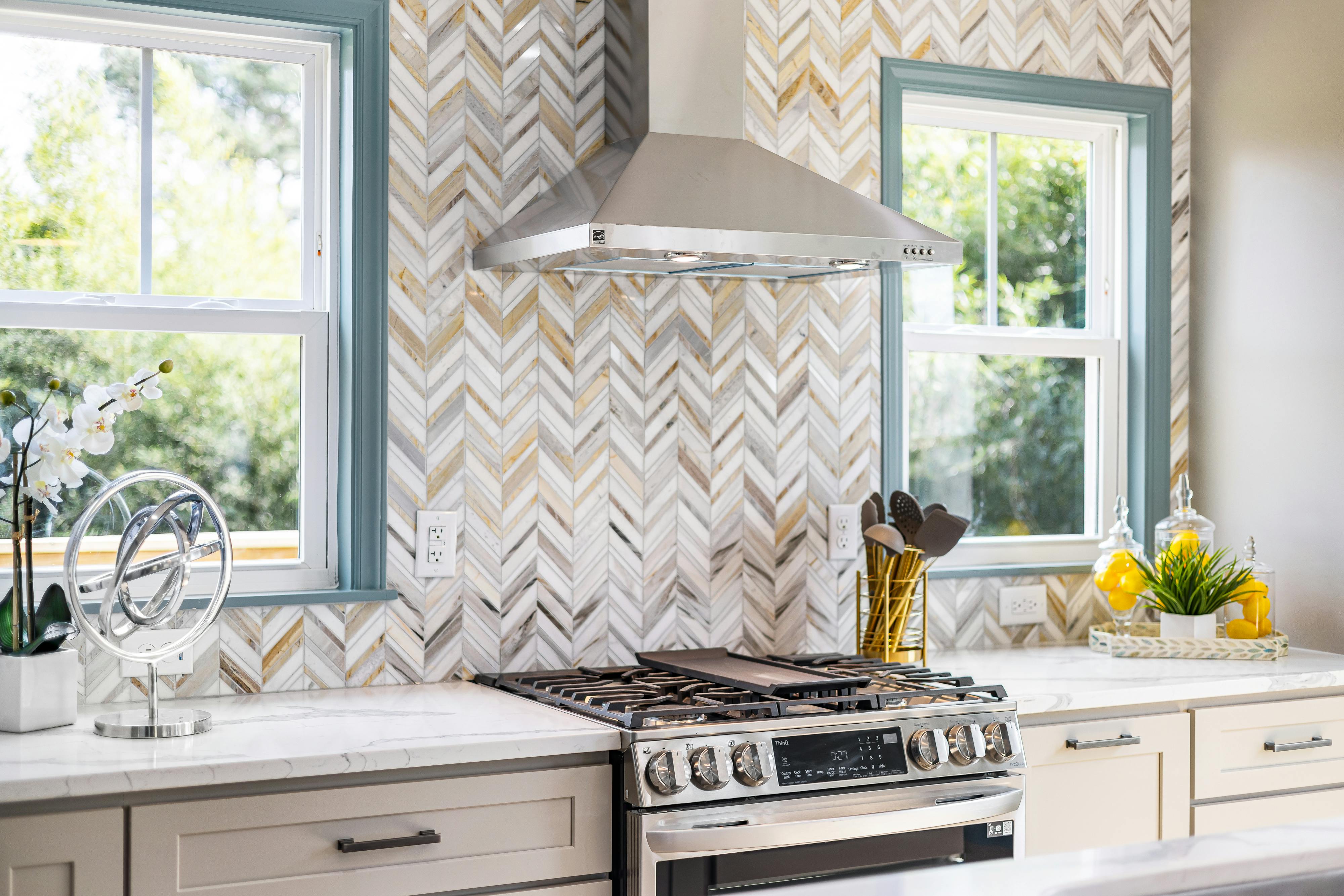 herringbone patterns backsplash in the kitchen