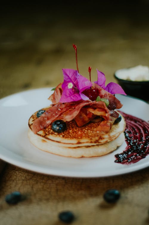 Free Pancake With Blueberry Toppings on White Ceramic Plate Stock Photo