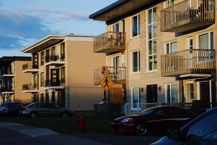 Residential Buildings On Town Street On Sunset