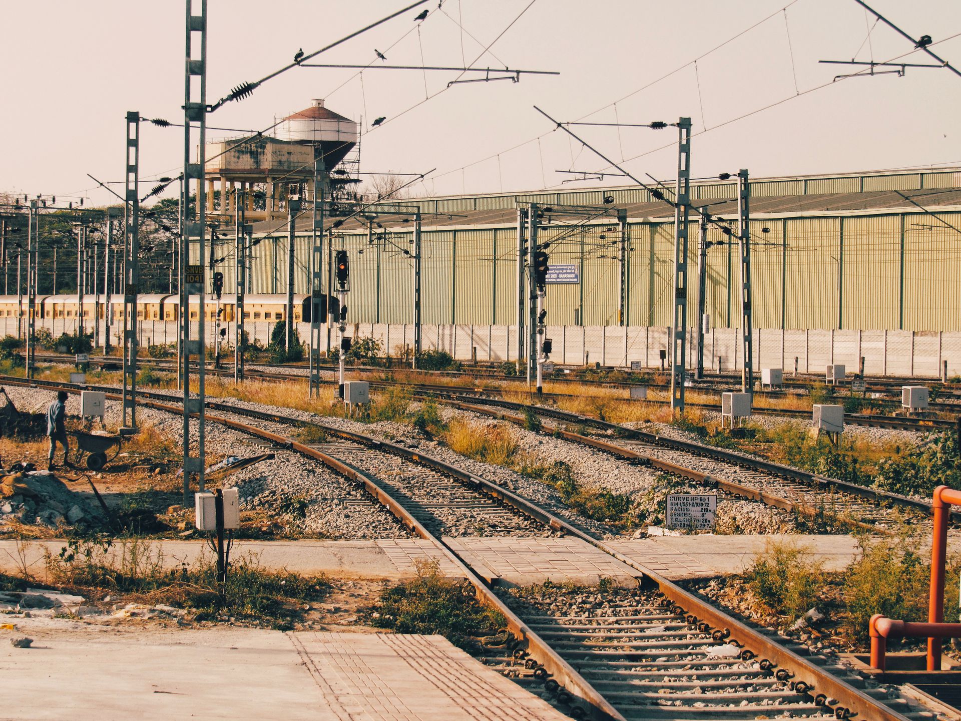 View of railway tracks and infrastructure at a station in Bengaluru, India.