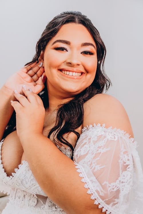 Young Brunette in a White Dress 