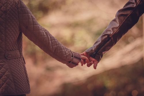 Couple Holding Hands and Walking · Free Stock Photo