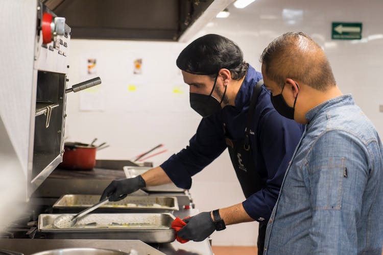 Men Cooking In Kitchen