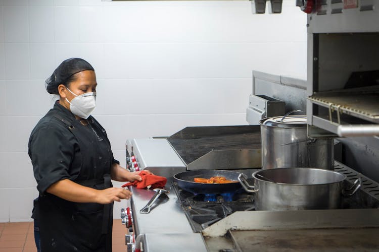 Cook Working In Mask