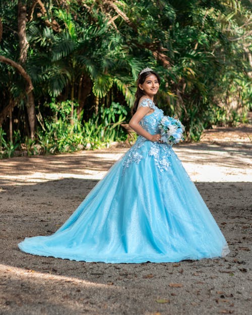 Brunette Woman in Blue Dress