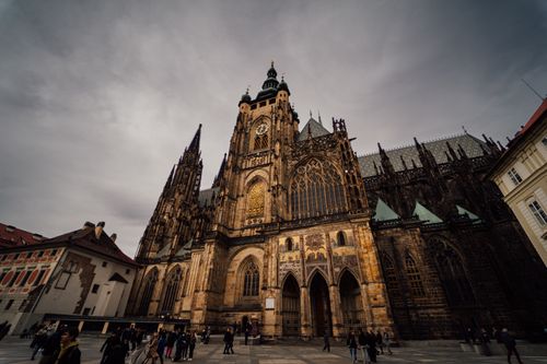 Free Gothic St. Vitus Cathedral, a prominent landmark in Prague, captured under cloudy skies. Stock Photo