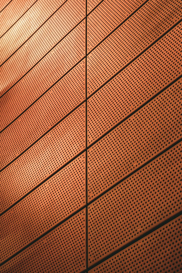 Brown Wall Designed With Holes