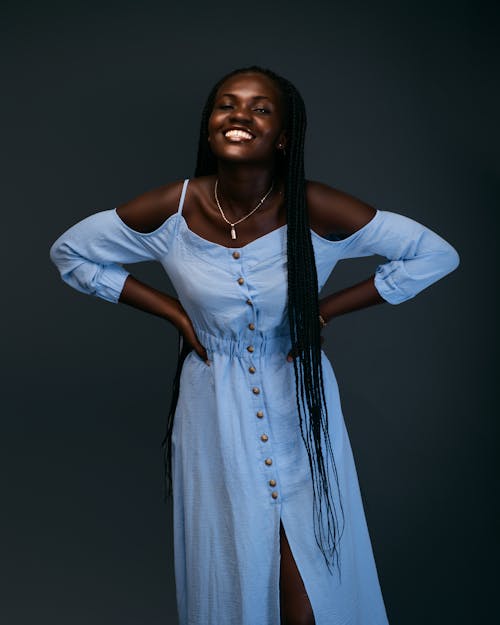 Smiling Woman in White Dress