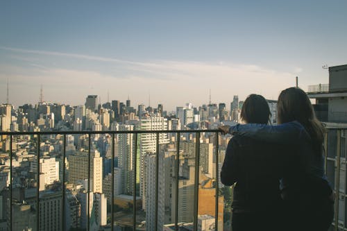 Woman Standing Beside Person