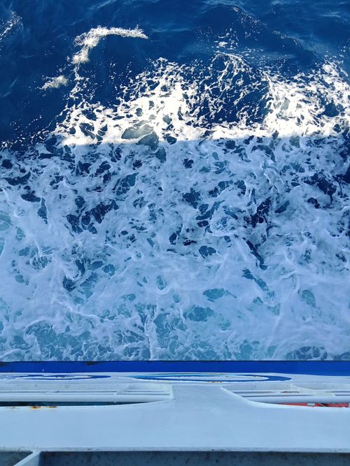 Free Dynamic ocean waters seen from a ship, captured in Gökçeada, Türkiye. Stock Photo