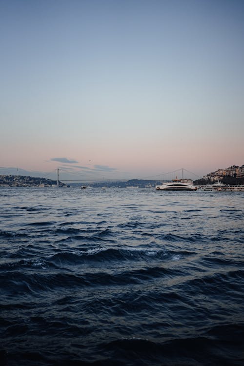 akşam karanlığı, deniz, deniz manzarası içeren Ücretsiz stok fotoğraf