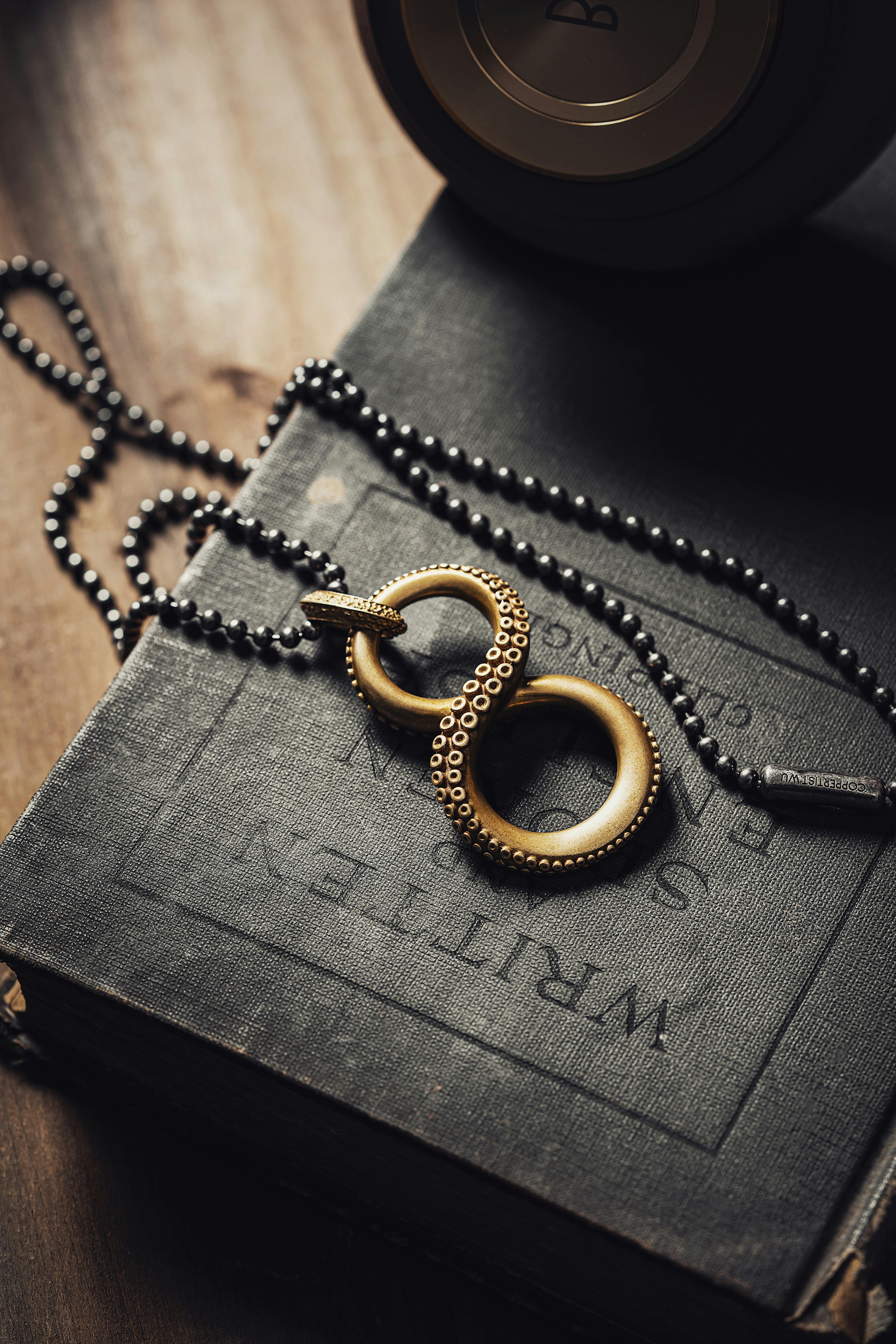 Octopus Infinity Symbol on Hardcover Book · Free Stock Photo