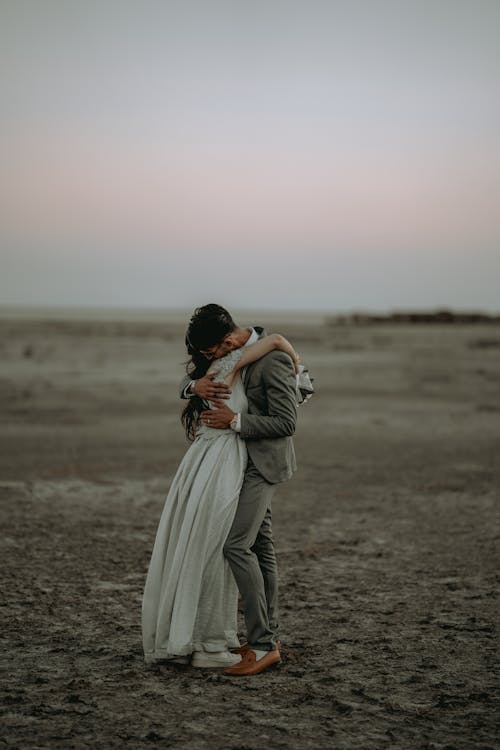 Couple Embracing in Desert