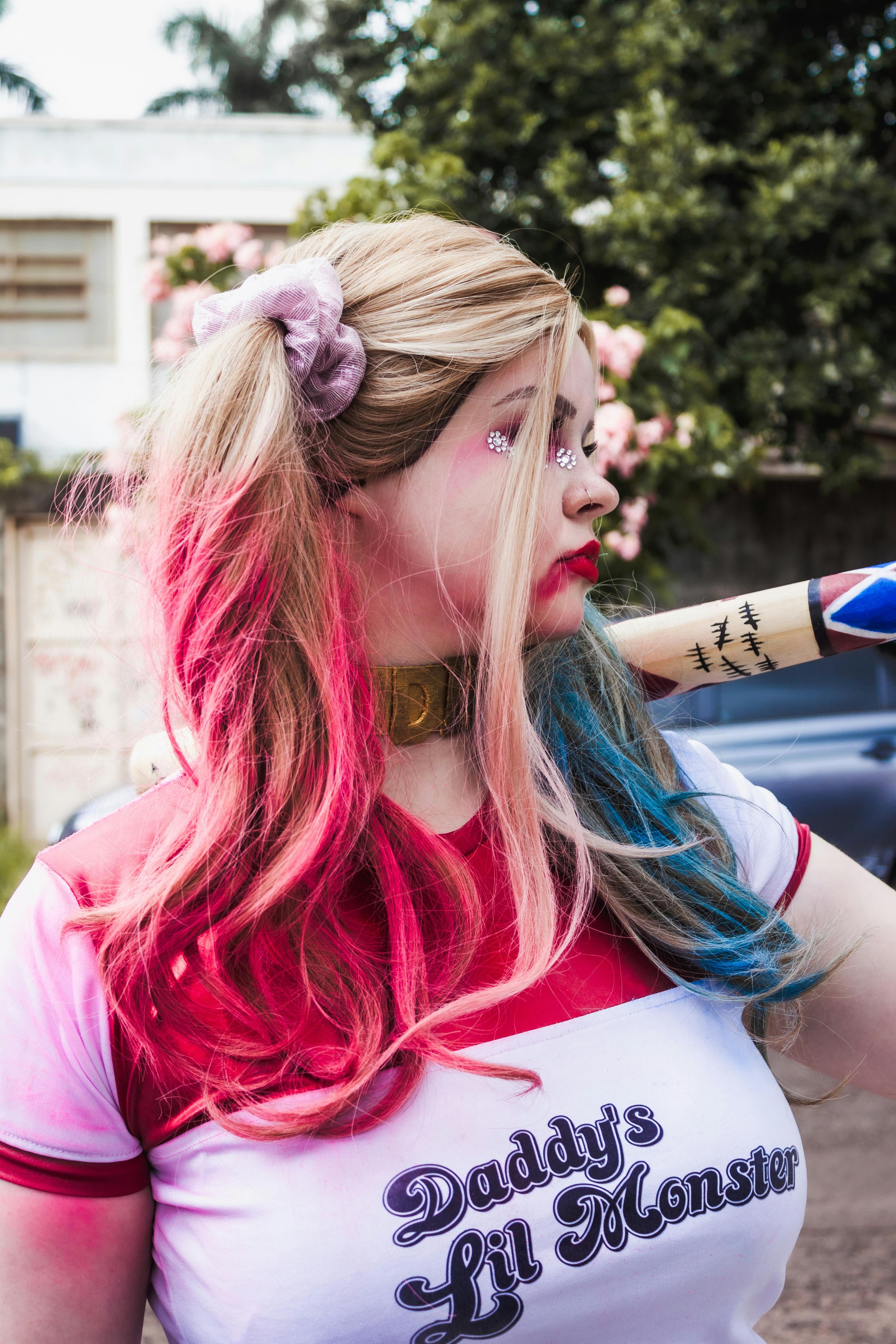 young woman in a harley quinn costume